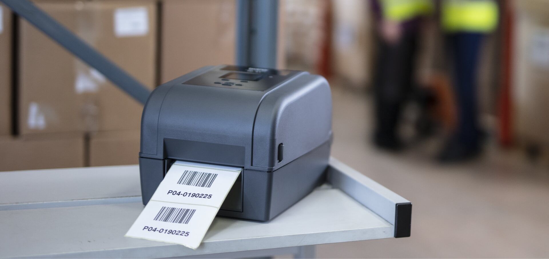 TD 4 Printer Sitting on Warehouse Shelf Printing Labels