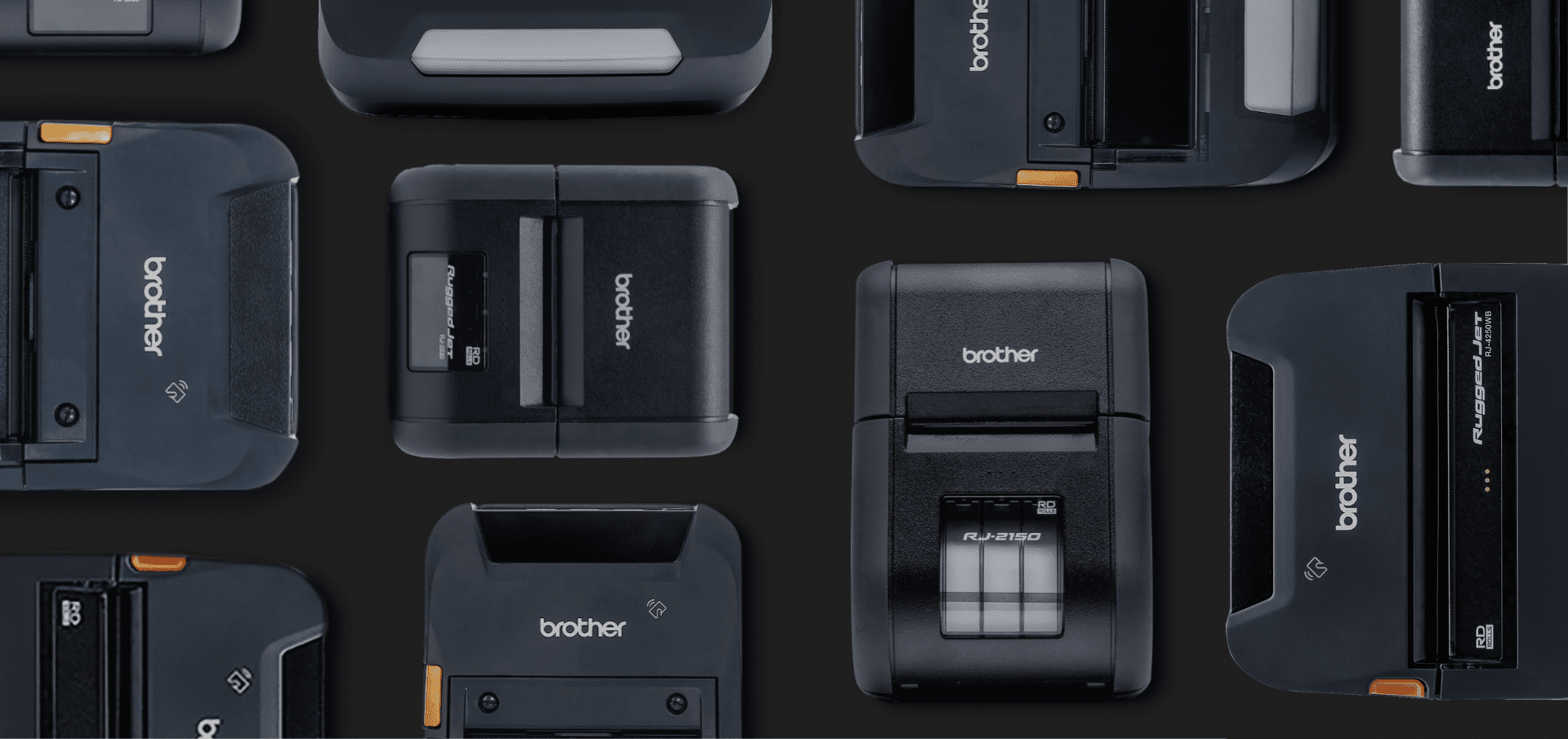 Multiple Brother label printers arranged on a dark background, viewed from above.