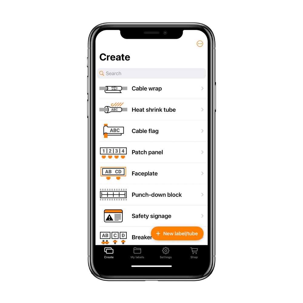 A smartphone displaying the Pro Label Tool app showcases its professional labeling features. The screen offers options like Cable Wrap, Heat Shrink Tube, and Safety Signage, each with icons. Navigation tabs include Create, My Labels, Settings, and Shop. An orange button reads New label/tube.