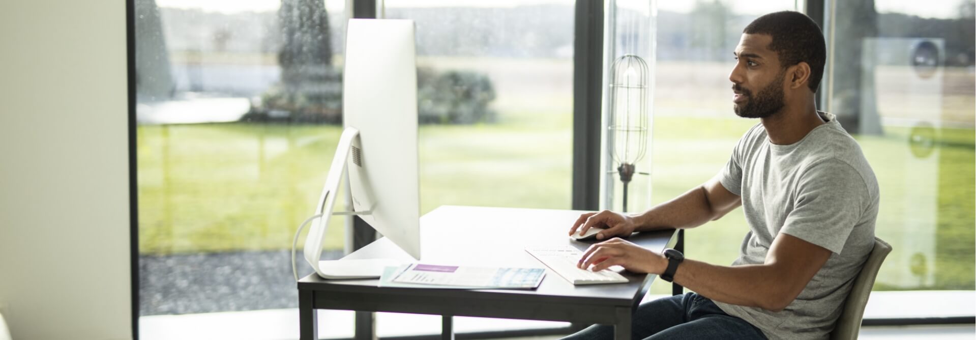 Man using computer in his house