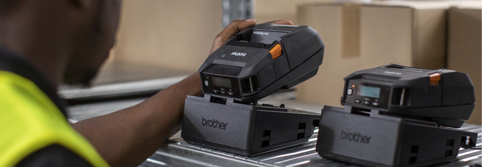 RuggedJet 3 Series Mobile Printers Charging on Warehouse Shelf