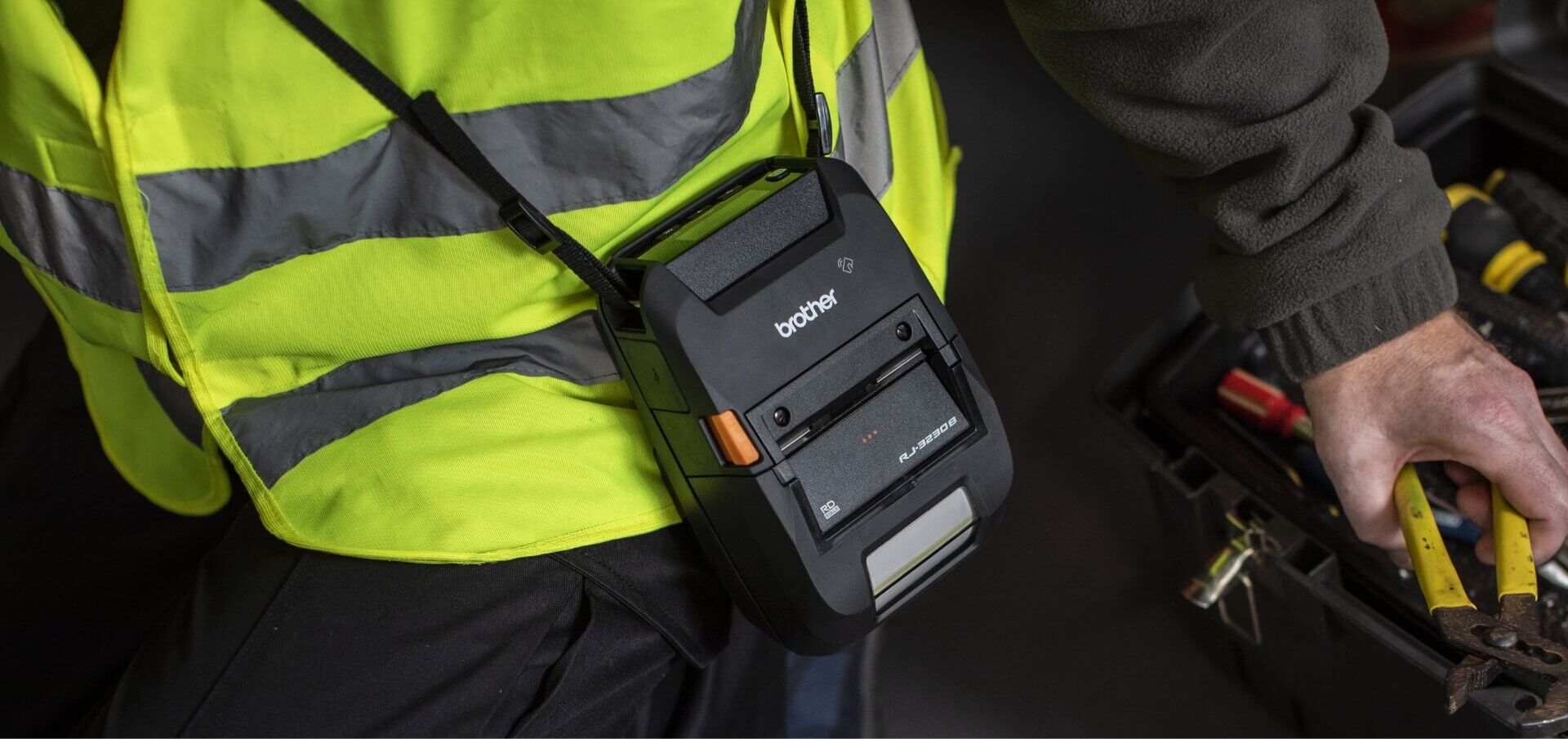 Field Service Technician using a RuggedJet 3200 on a Shoulder Strap